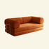 Orange modular teddy sofa replica on a beige background