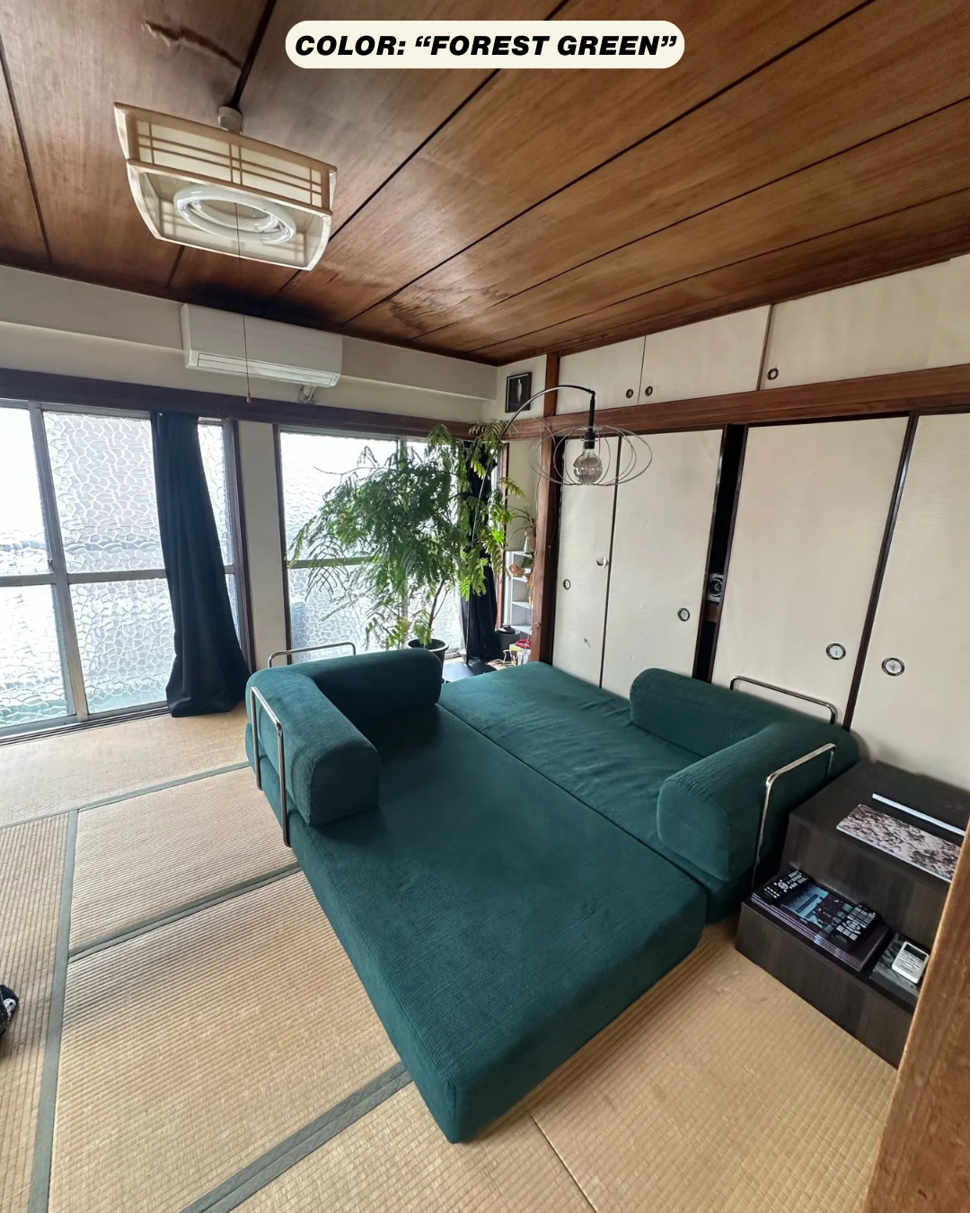 The modular comfortForm sofa in forest green in a living room