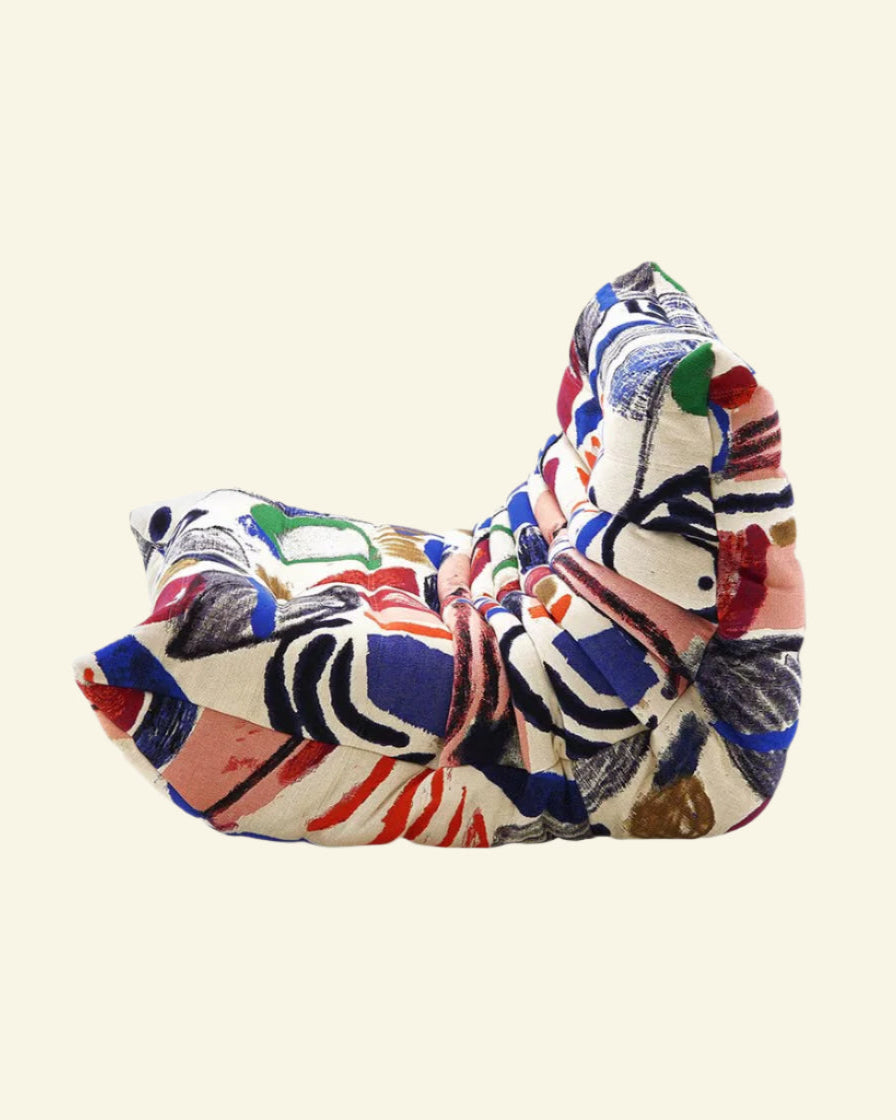 Graffiti-inspired Togo-style sofa set with velvet suede upholstery and a low, frameless caterpillar design for modern living spaces.