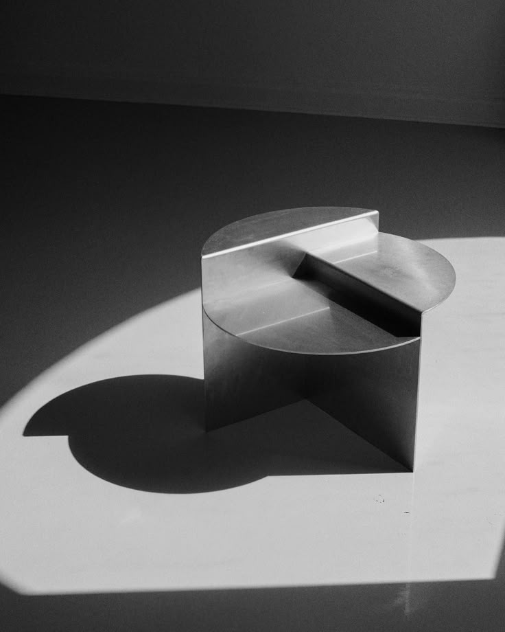 Contemporary chrome side table with edgy design – statement piece for modern homes and studios