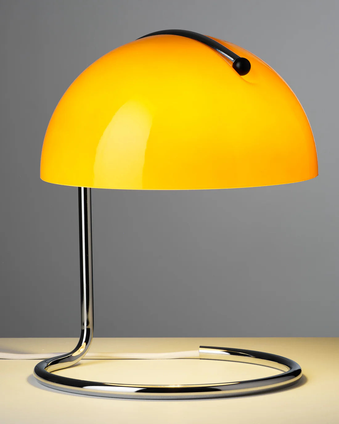 Yellow table aromatherapy lamp with a gray background