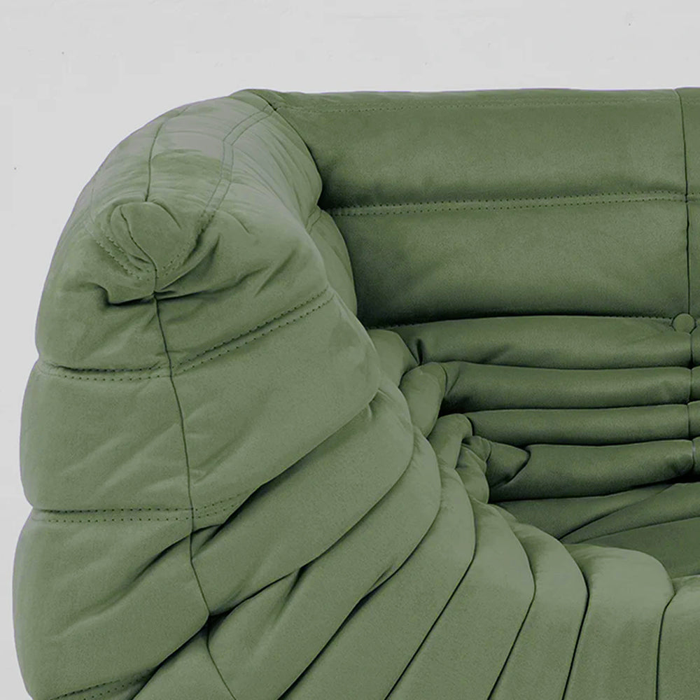 Relaxed modular chair dupe with Togo silhouette designed by michael ducaroy for ligne roset – custom-made green velvet seating for modern interiors
