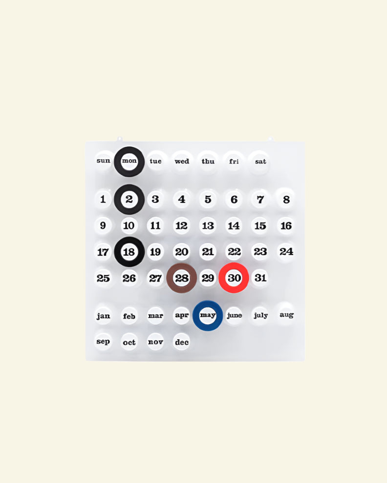 White Perpetual Ring-a-Date Calendar in Italian design, available in white, green, and yellow — a stylish, eco-friendly wall calendar for modern interiors.