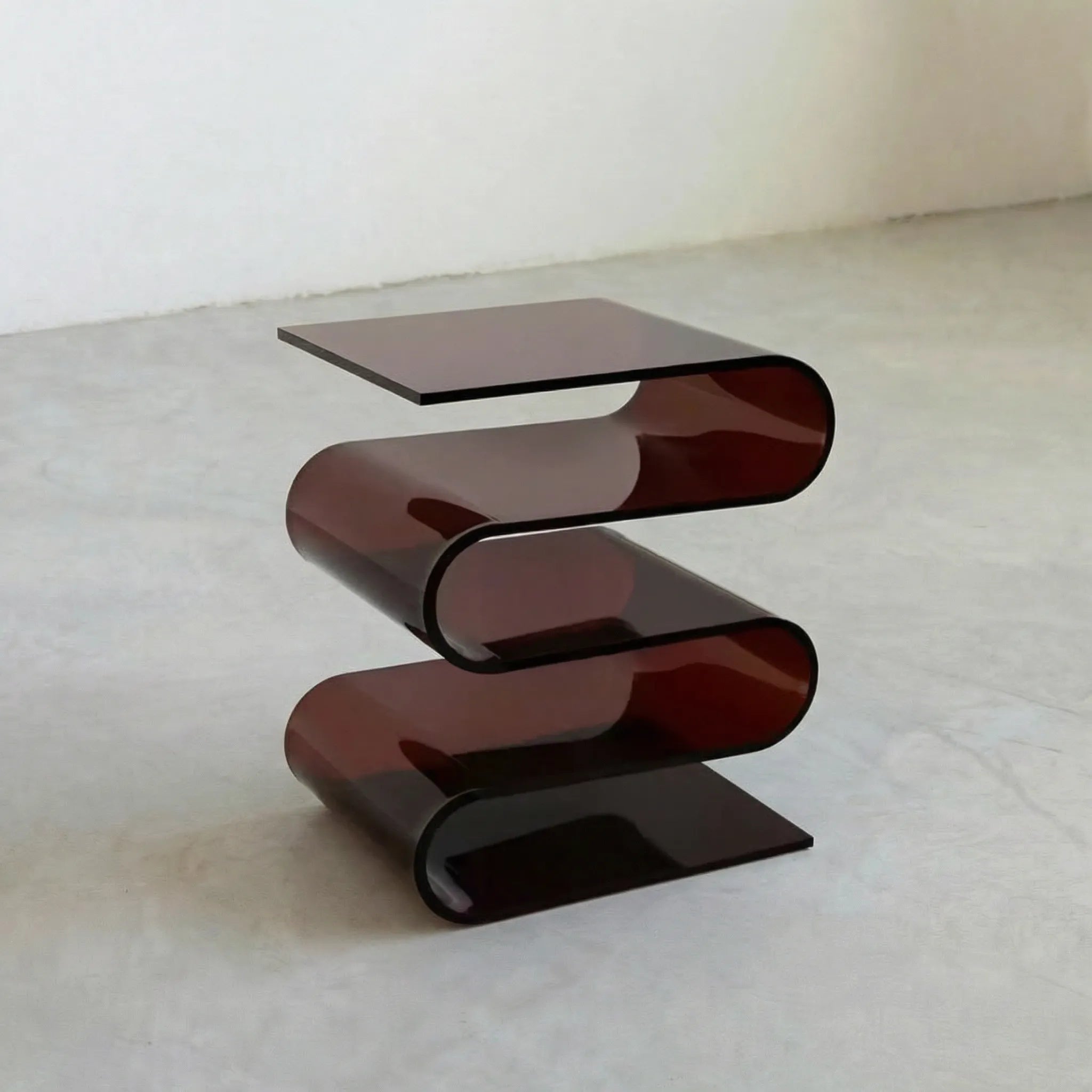Acrylic S Shaped Side Table side table with a wavy design on a white background