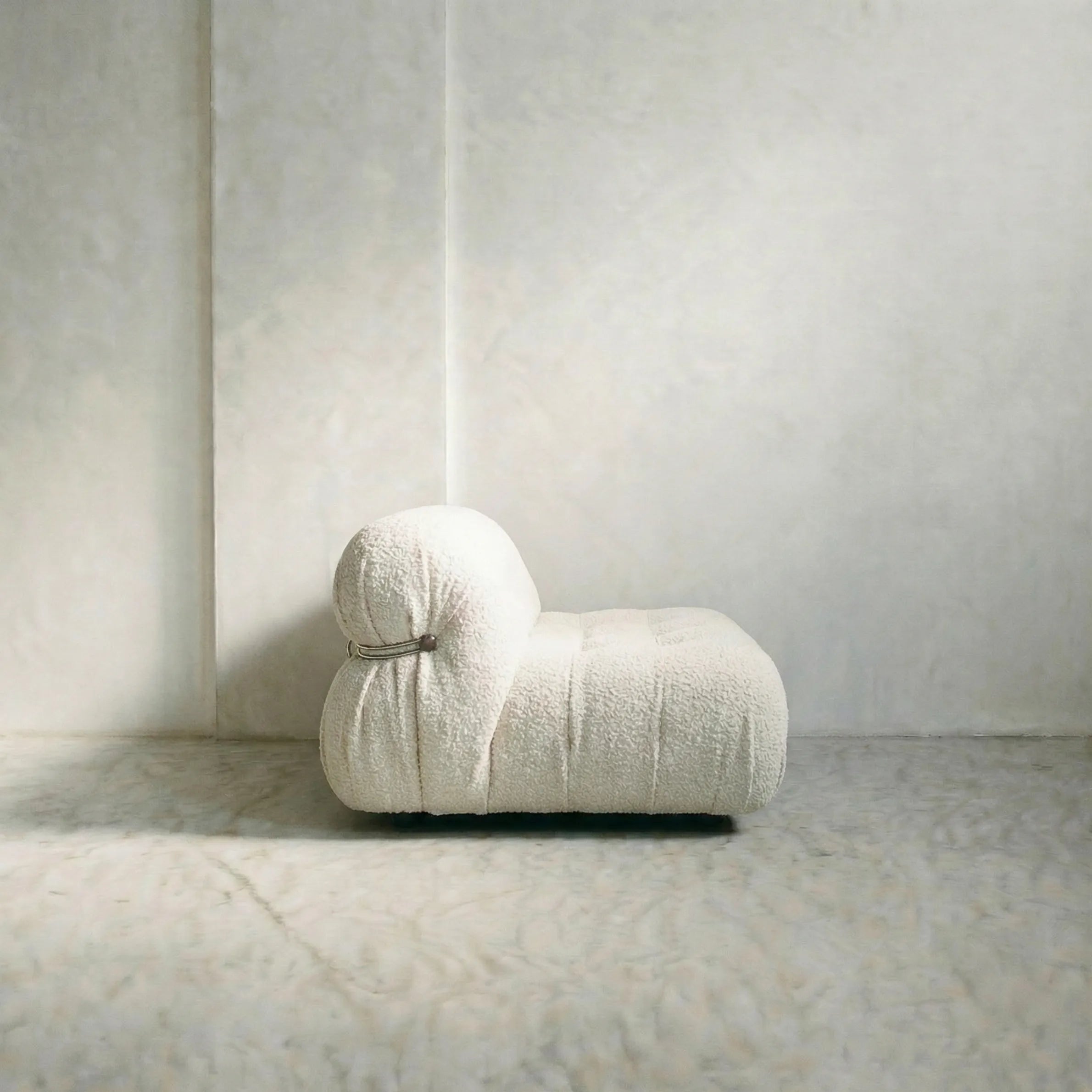 soriana sofa 2-seater dupe in white bouclé on gray floor with white wall background