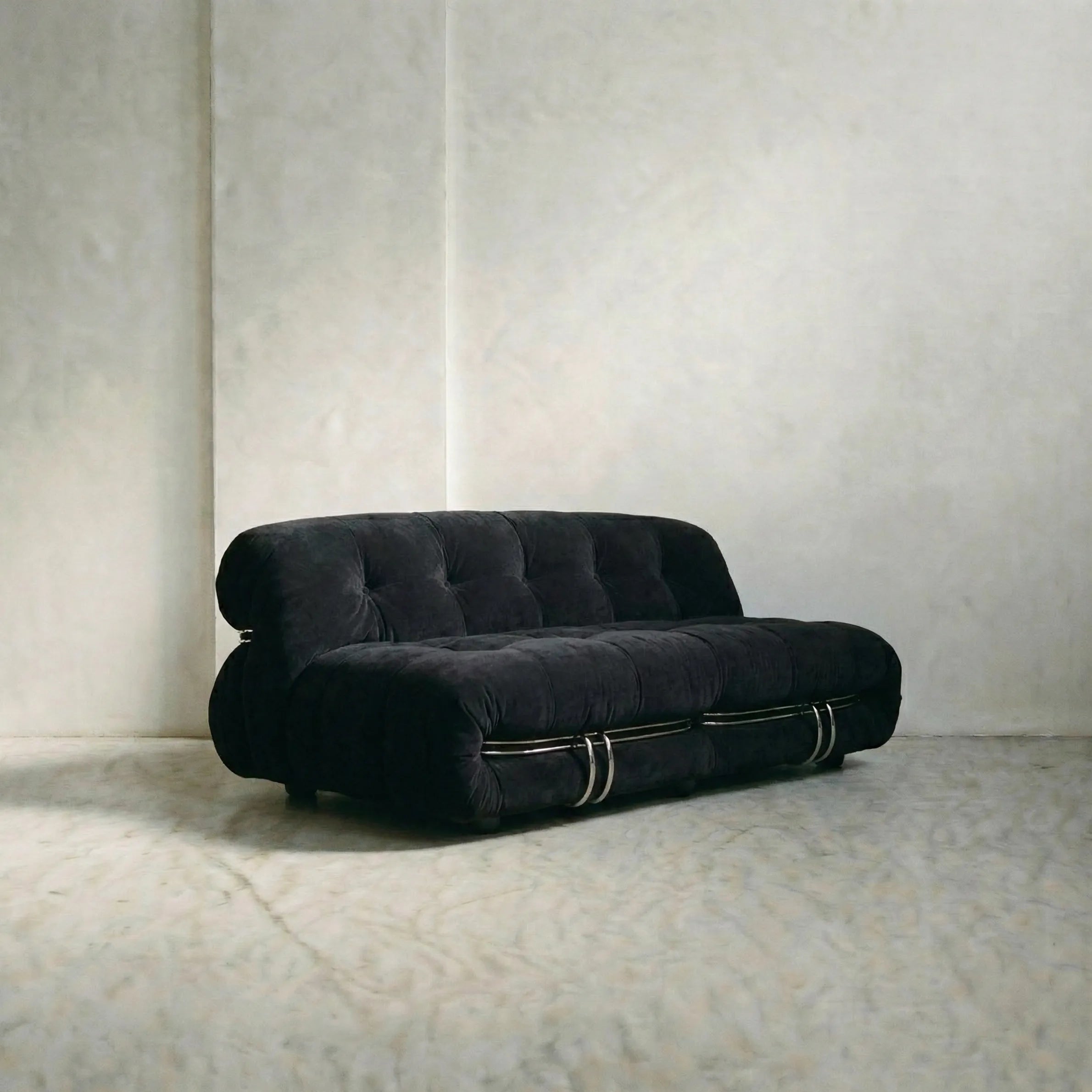 soriana sofa 2-seater dupe in black flannel on gray floor with white wall background