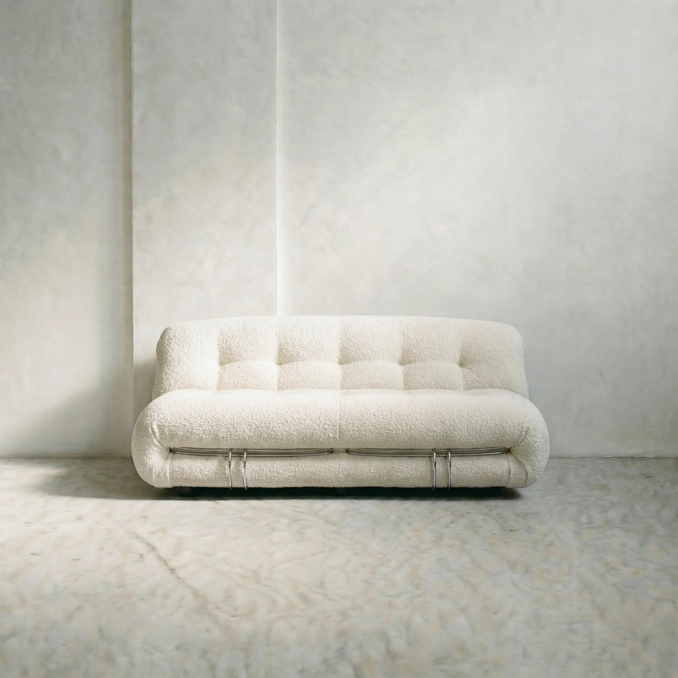 soriana sofa 2-seater dupe in white bouclé close-up with chrome clamp detail on light background