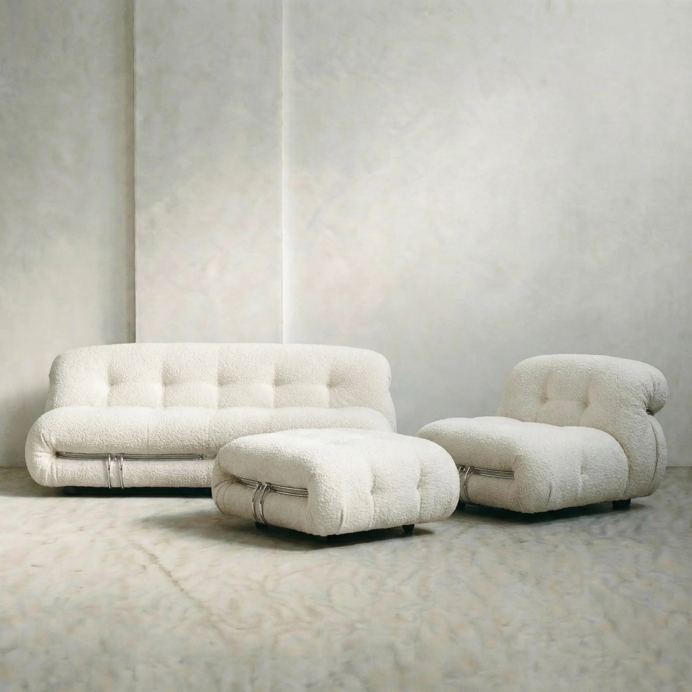 soriana sofa 2-seater dupe in white bouclé close-up with chrome frame detail on light gray surface