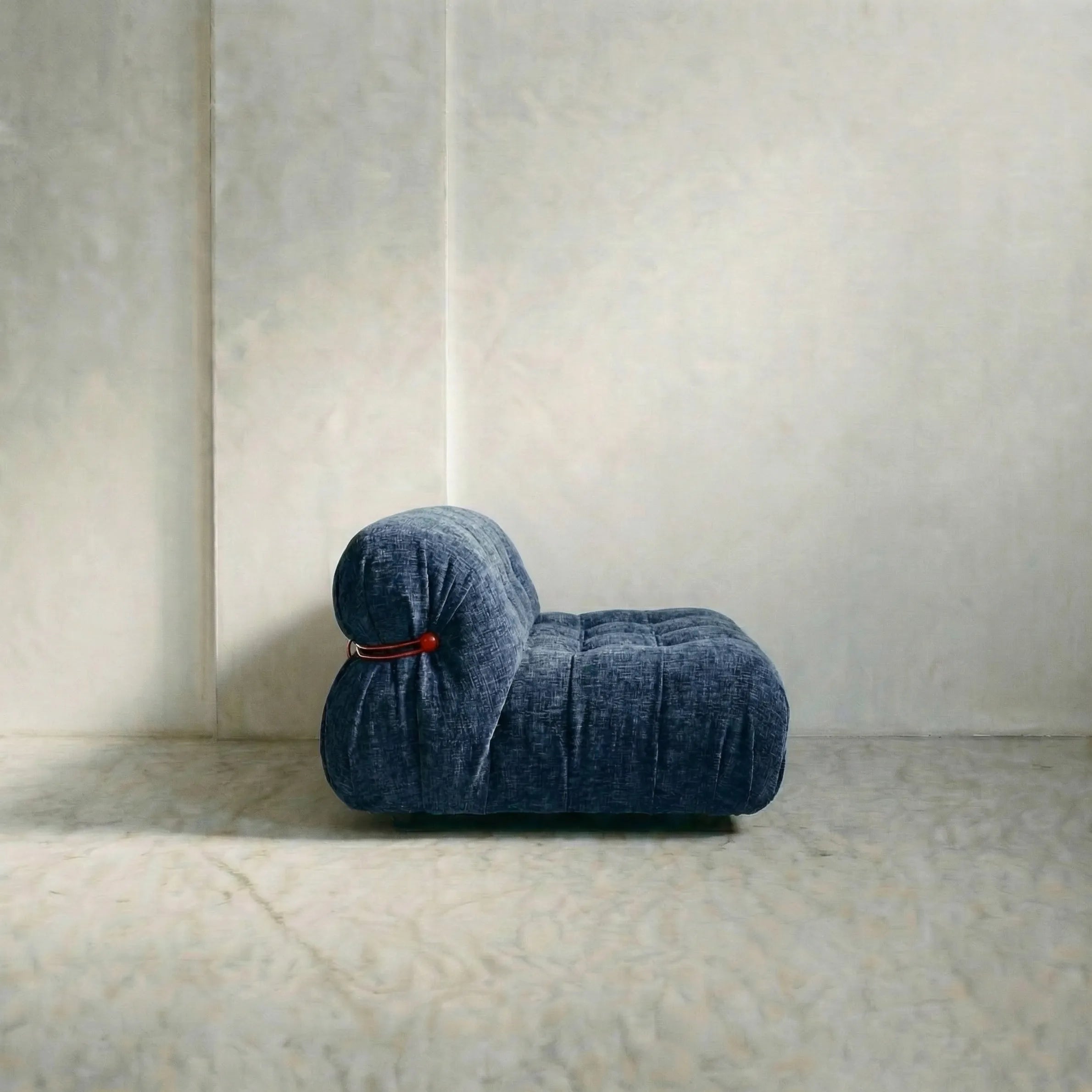 soriana sofa 2-seater dupe in blue chenille with red chrome bar close-up with chrome clamp detail on light background