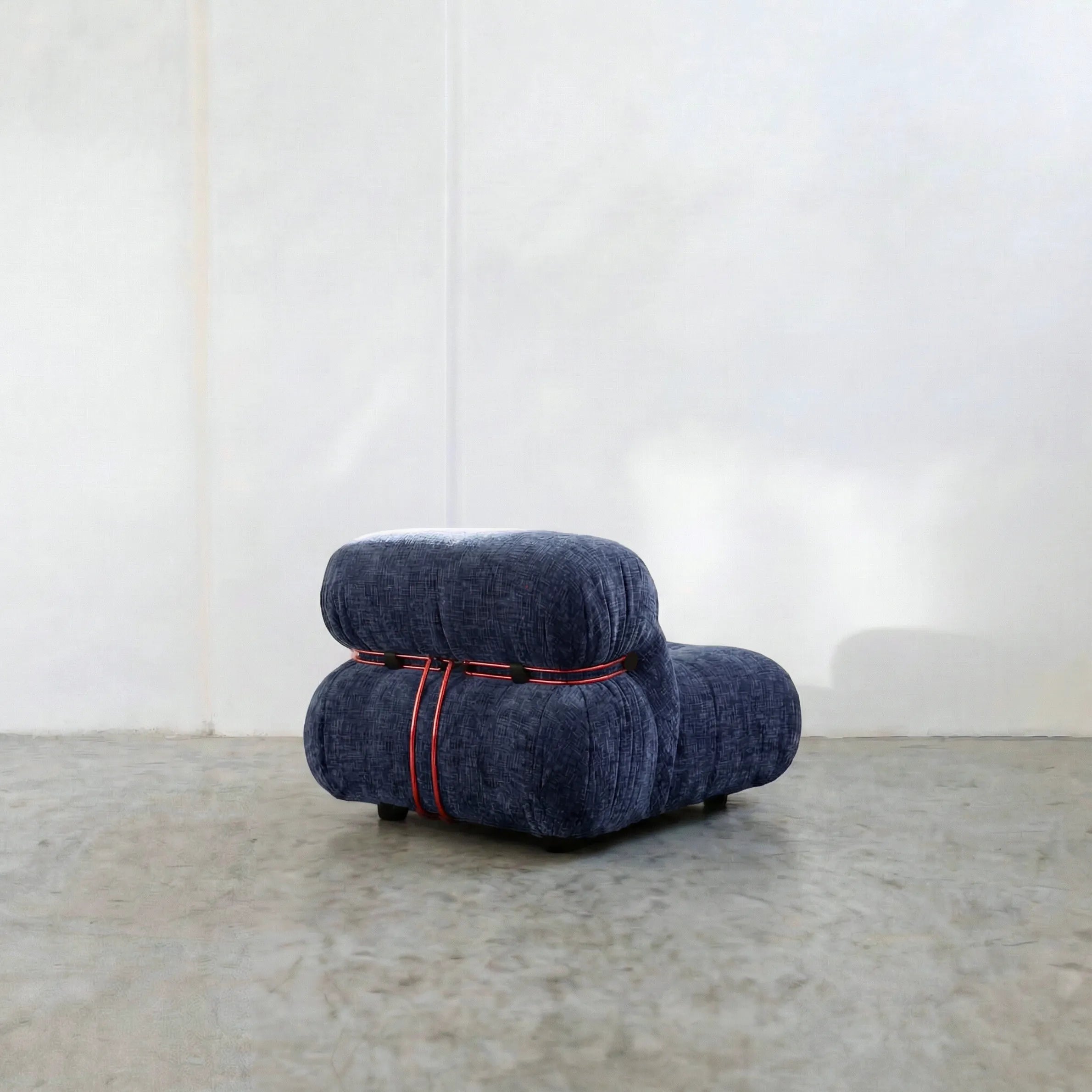 soriana chair dupe in blue chenille with red chrome bar close-up of textured upholstery