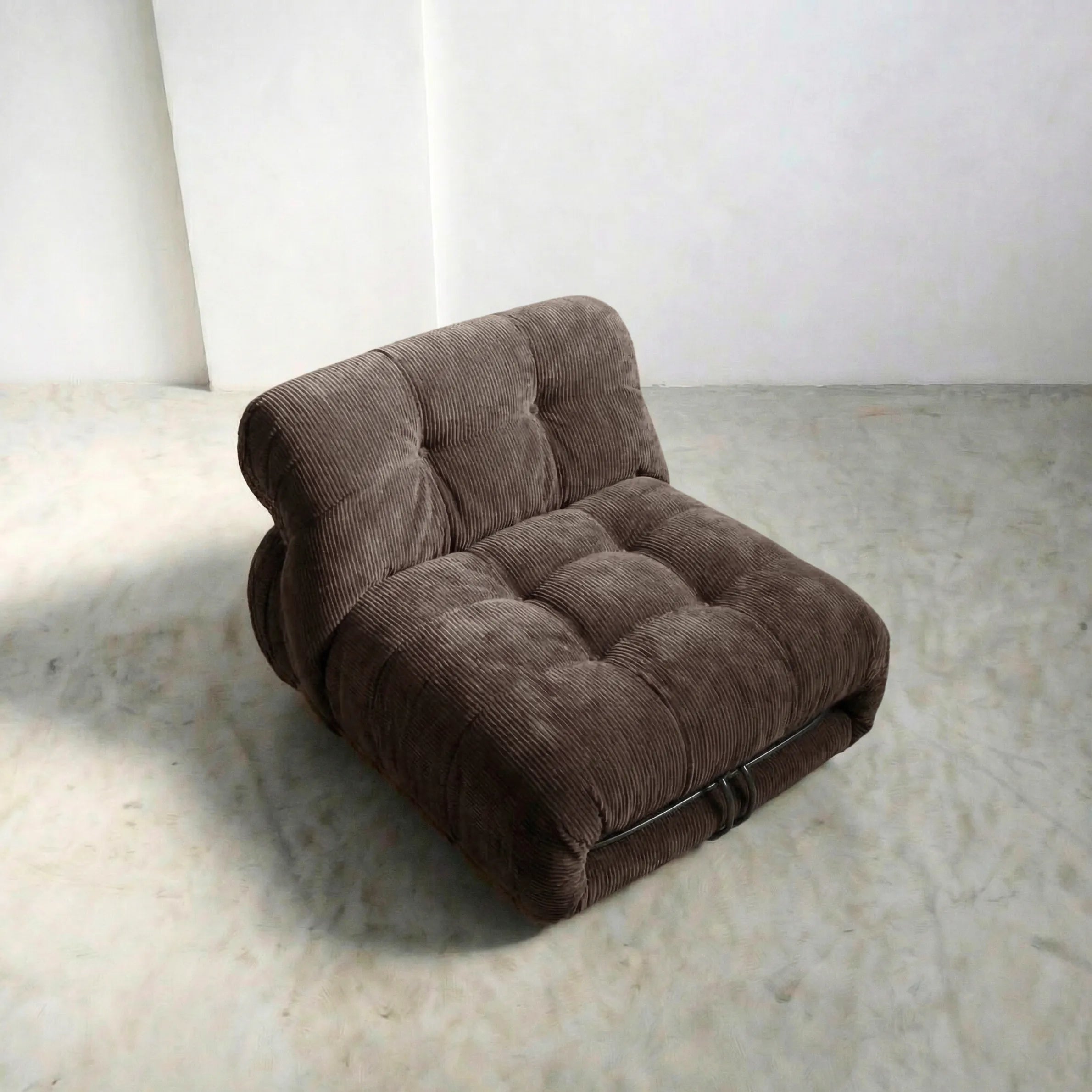 soriana chair dupe in chestnut corduroy close-up with chrome frame detail on light gray surface