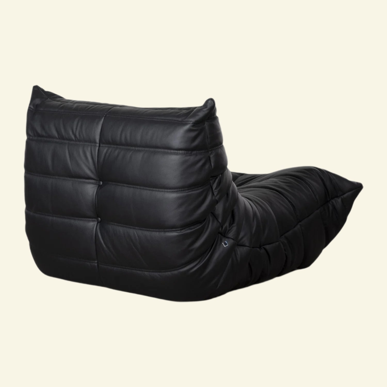 Black togo chair replica cushioned chair on a white background