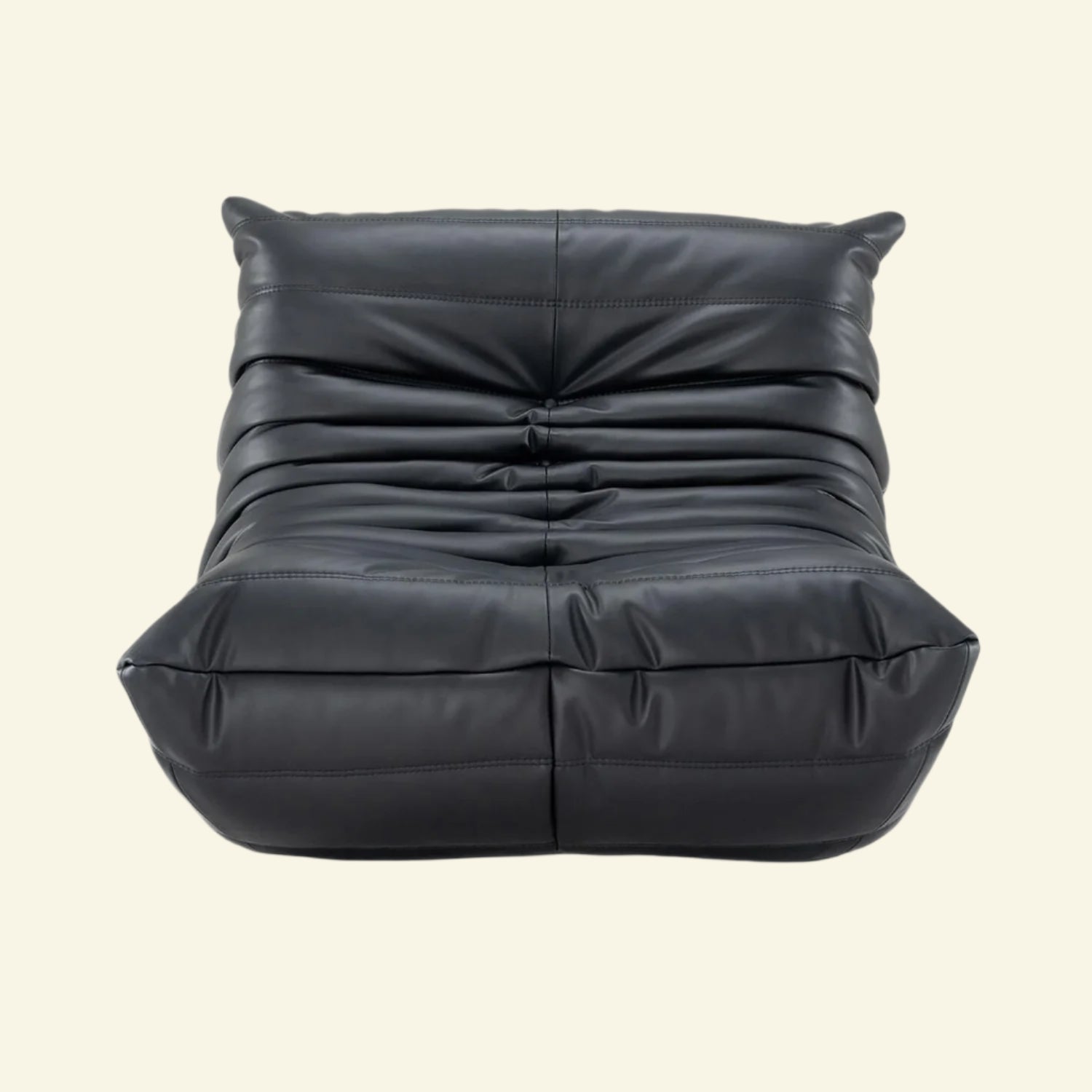 Black leather togo replica bean bag chair on a white background