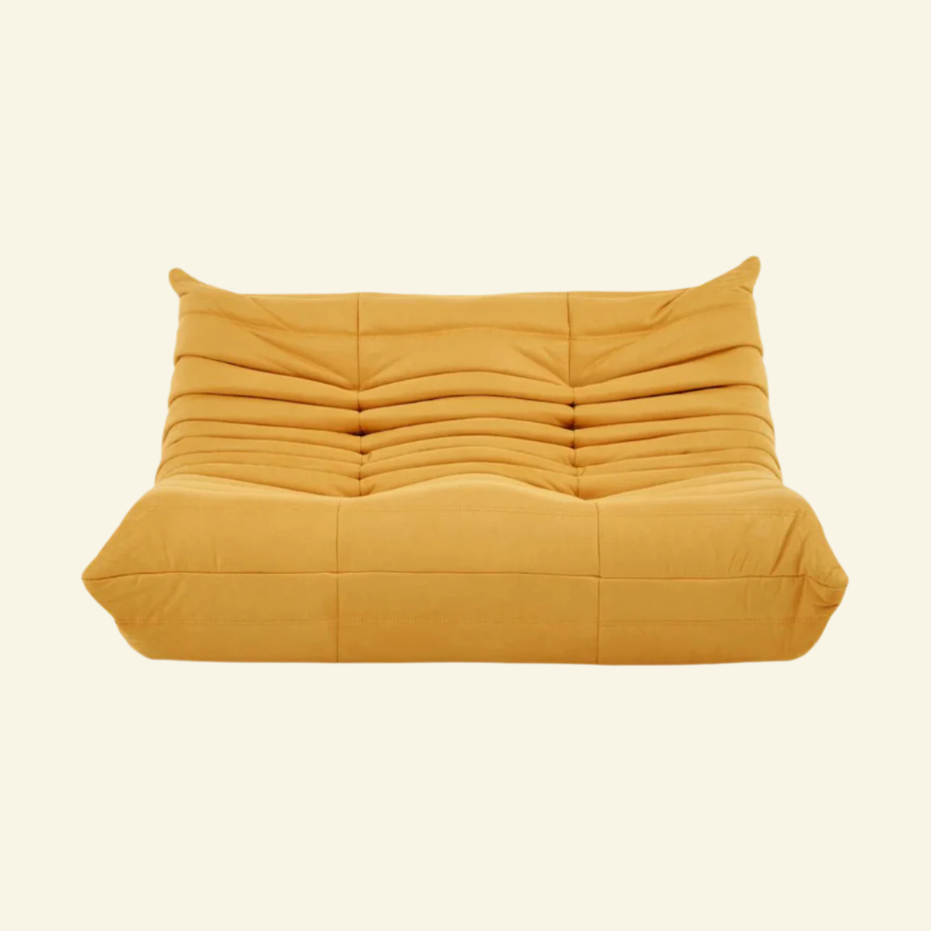 Togo-style 2-seater velvet sofa in yellow with low-profile design, plush channel tufting, and sculptural curves — inspired by Michel Ducaroy, ideal for modern interiors.