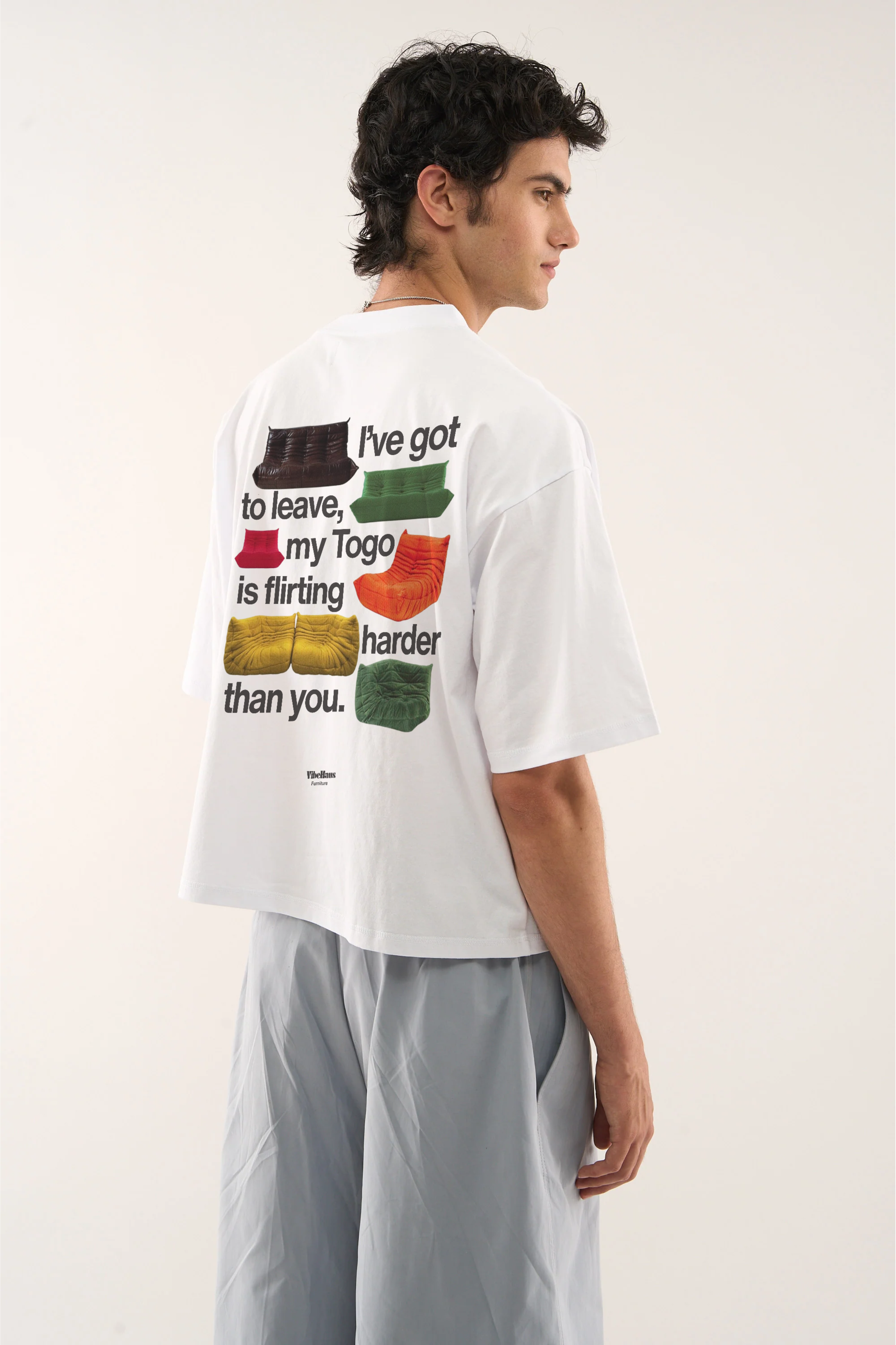 Togo Sofa T Shirt by Vibehaus on a male model