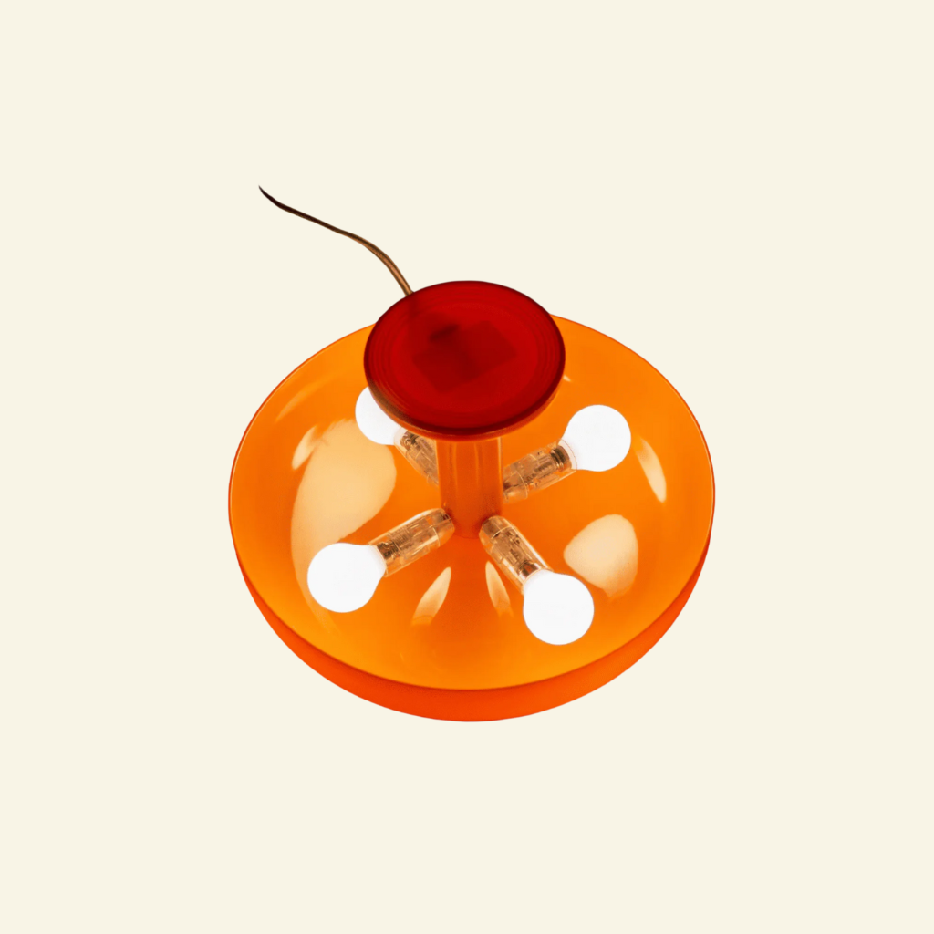 Bella table lamp in bold orange, mushroom-shaped design, retro-style lighting for modern interiors.