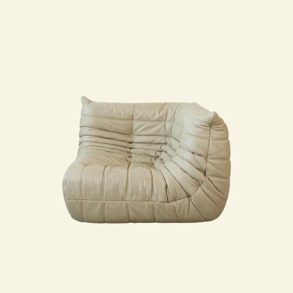 Bruma Corner Section in beige leather on beige background