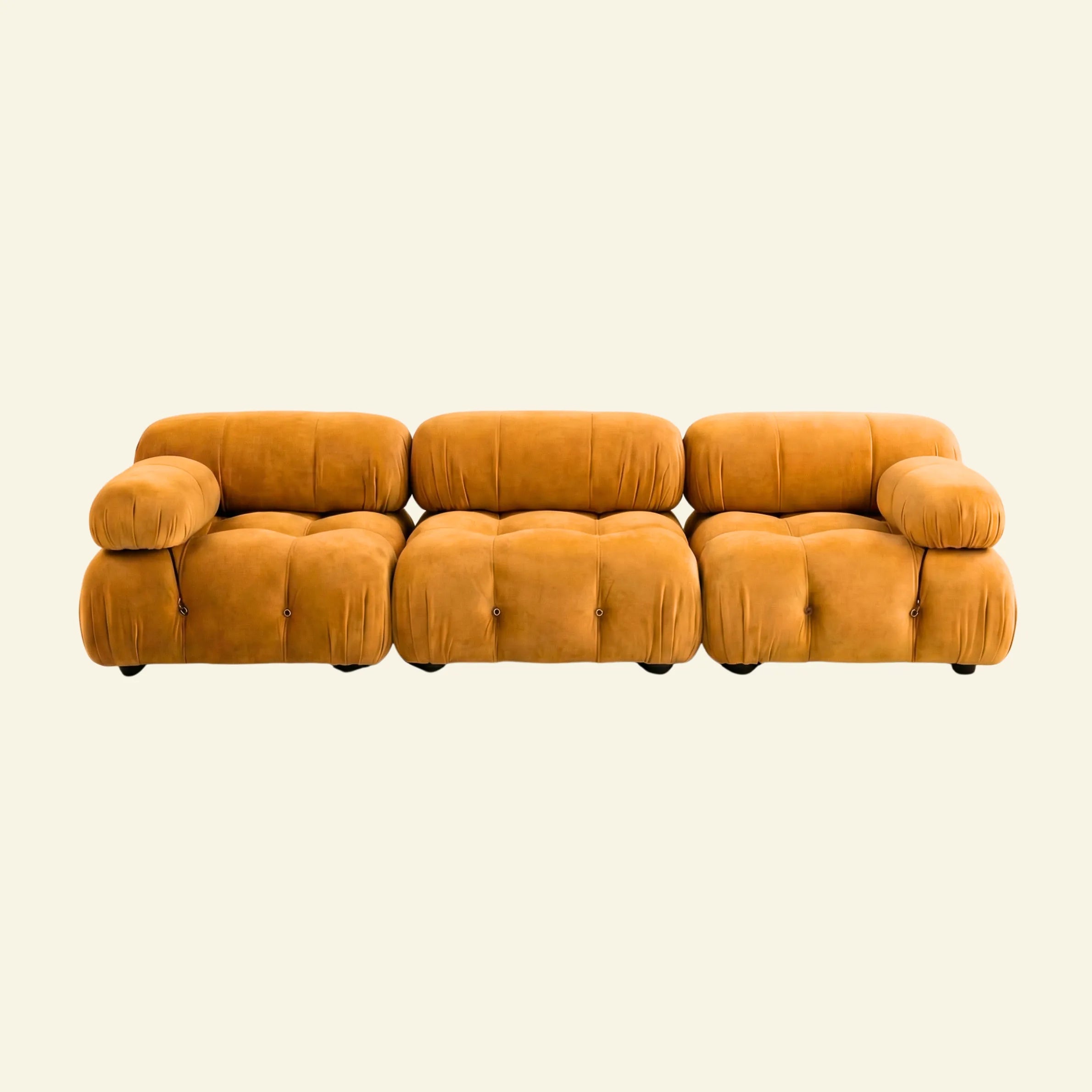 Camaleonda 3 seater modular sofa dupe in mustard velvet with tufted upholstery on a beige background