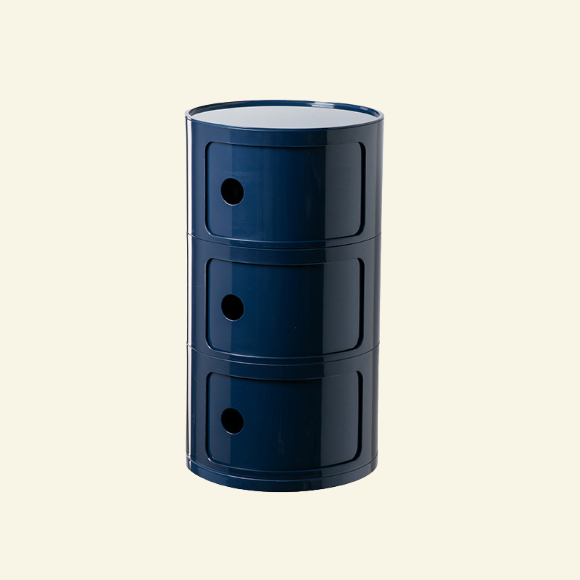 Kartell Componibili dupe round modular storage unit in navy blue glossy plastic with three tiers on beige background