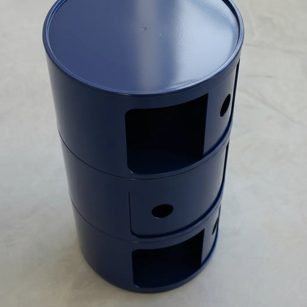 Navy Blue glossy round modular storage unit, Kartell Componibili dupe with three tiers in minimalist concrete studio