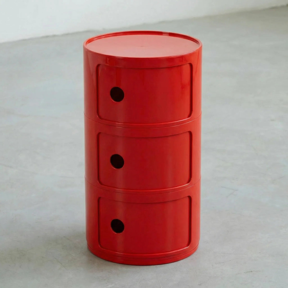 Rond modulair opbergmeubel in rood.