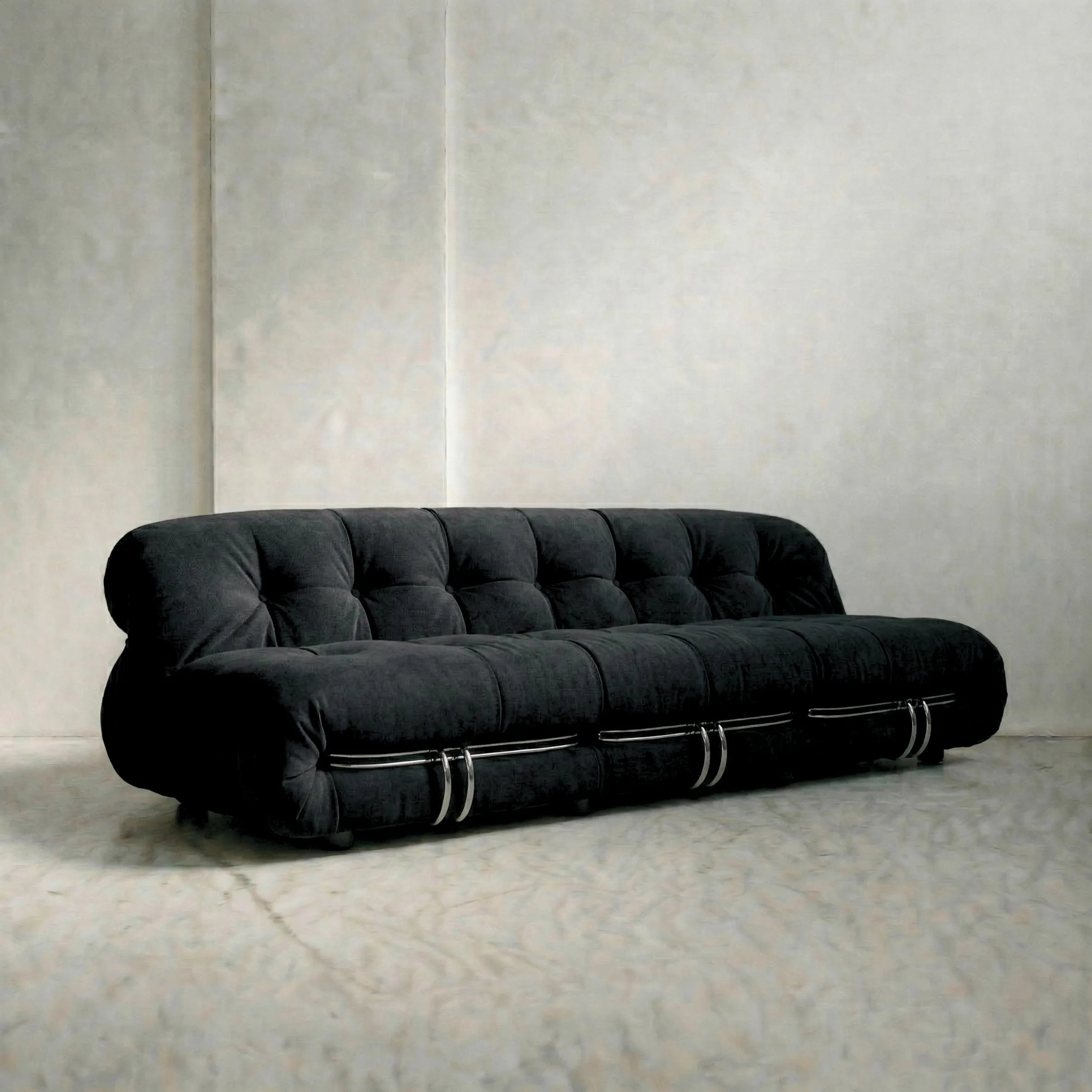 soriana sofa 3-seater dupe in black flannel close-up with chrome clamp detail on light background