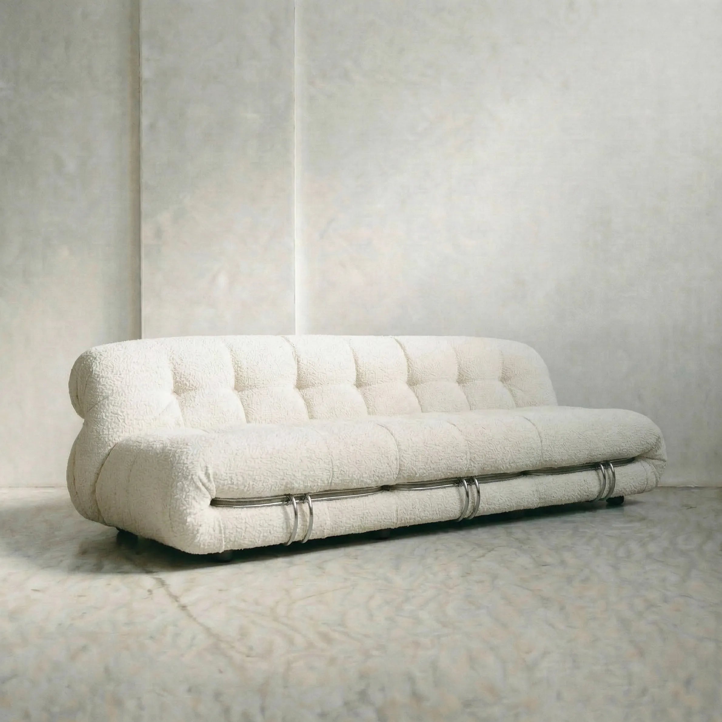 soriana sofa 3-seater dupe in white bouclé close-up with chrome clamp detail on light background