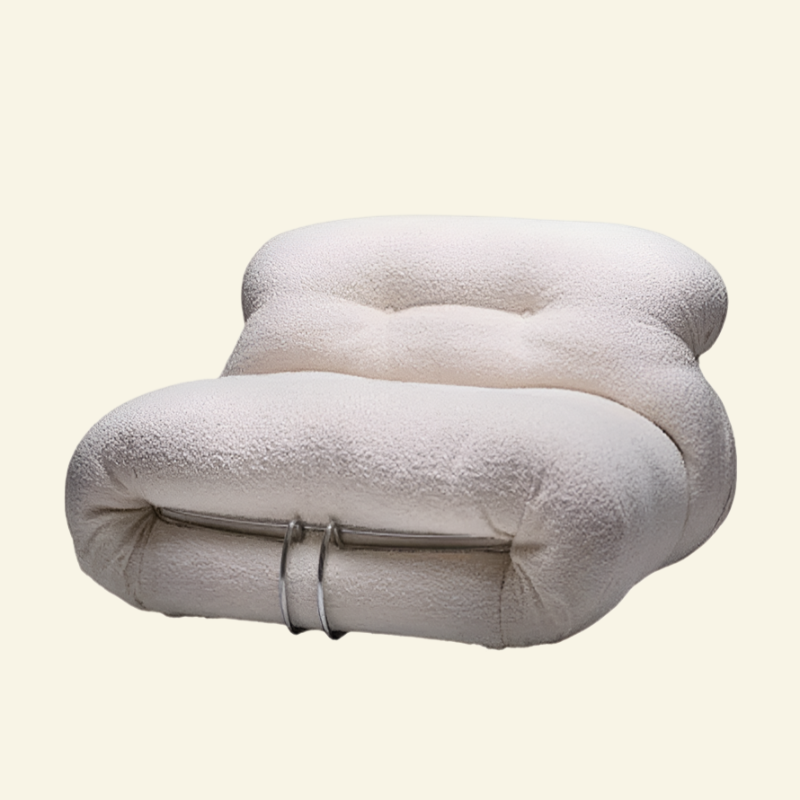 Vintage Soriana Lounger in white boucle on a cream background