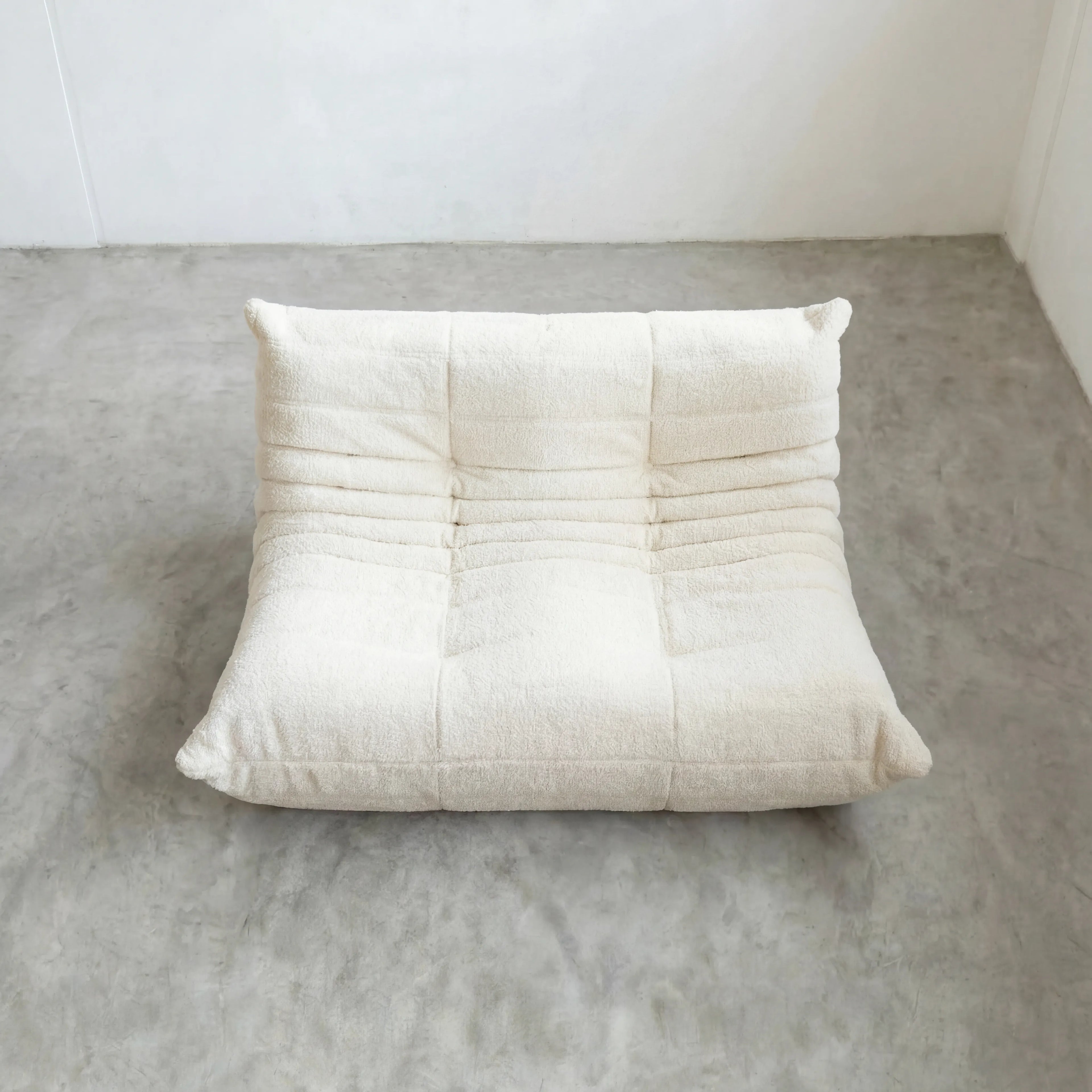 Togo 2-seater Sofa dupe in white bouclé with Togo silhouette designed by michael ducaroy for ligne roset – custom-made by vibehaus