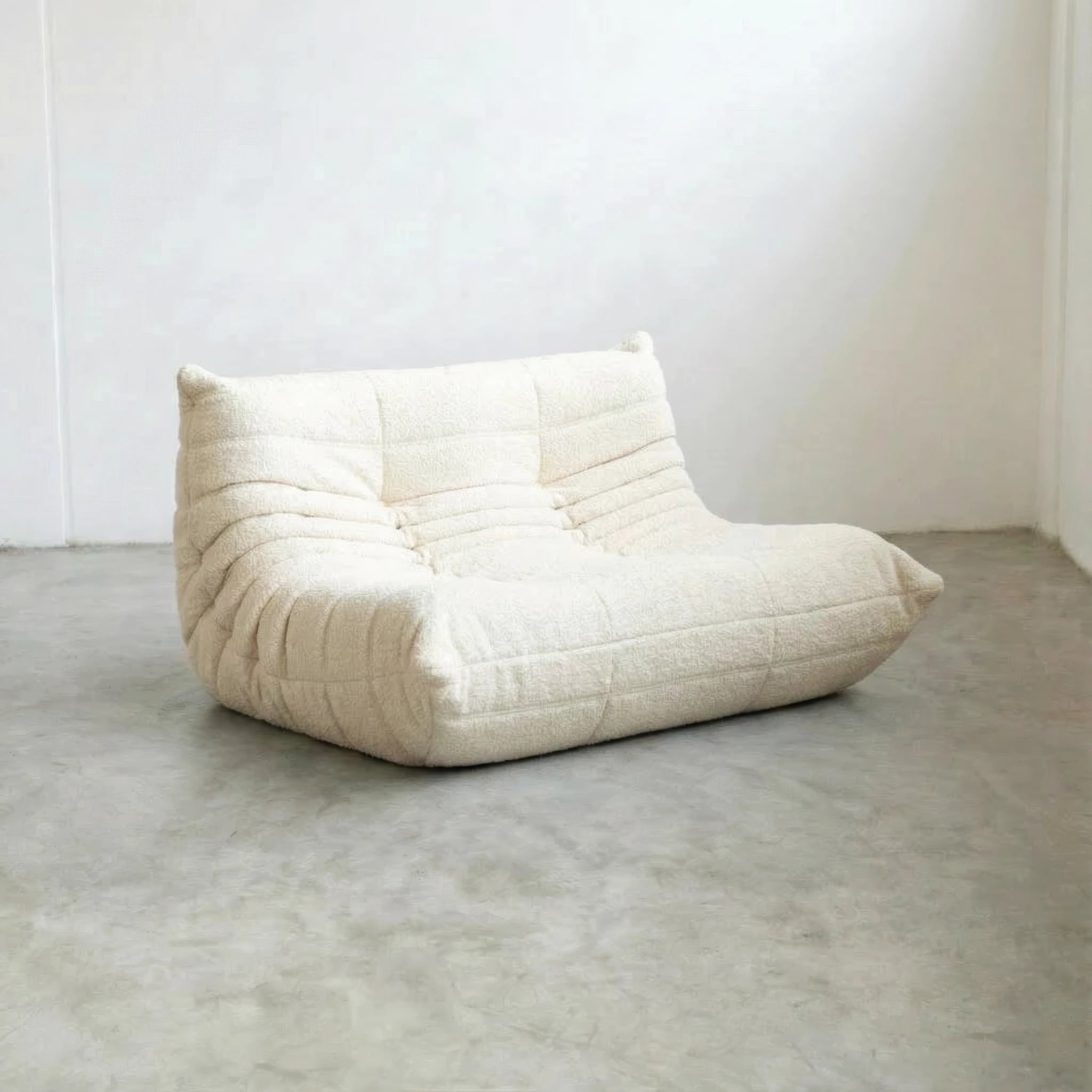 Togo 2-seater Sofa dupe in white bouclé with Togo silhouette designed by michael ducaroy for ligne roset – custom-made by vibehaus