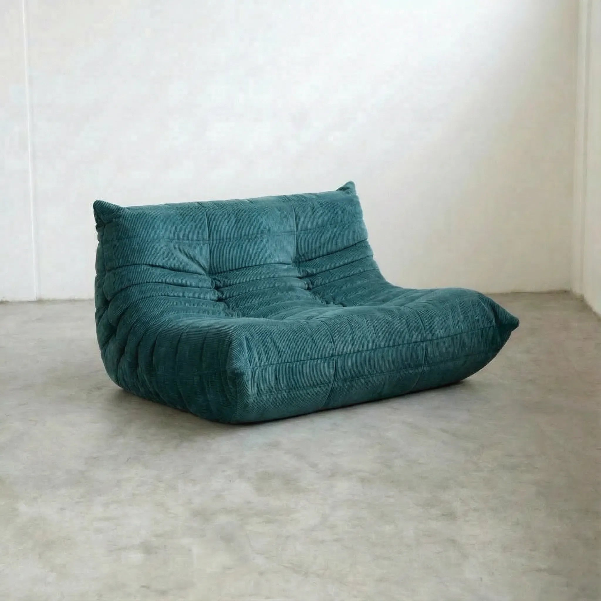 Togo 2-seater Sofa dupe in turquoise blue corduroy with Togo silhouette designed by michael ducaroy for ligne roset – custom-made by vibehaus