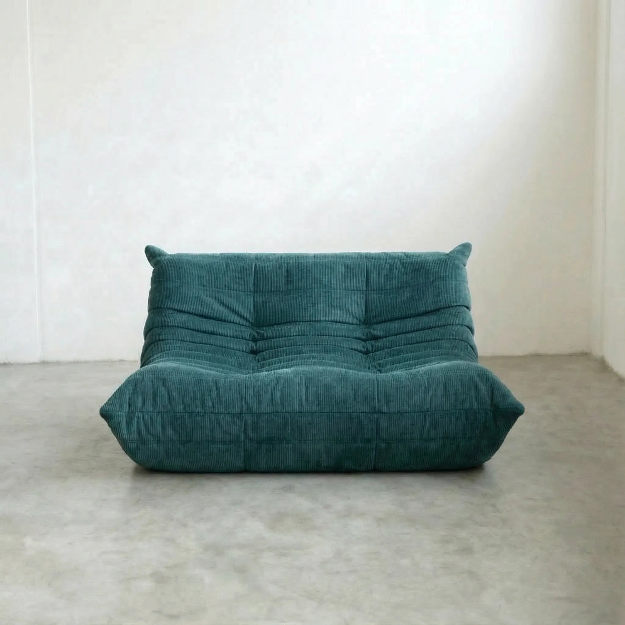 Togo 2-seater Sofa dupe in turquoise blue corduroy with Togo silhouette designed by michael ducaroy for ligne roset – custom-made by vibehaus