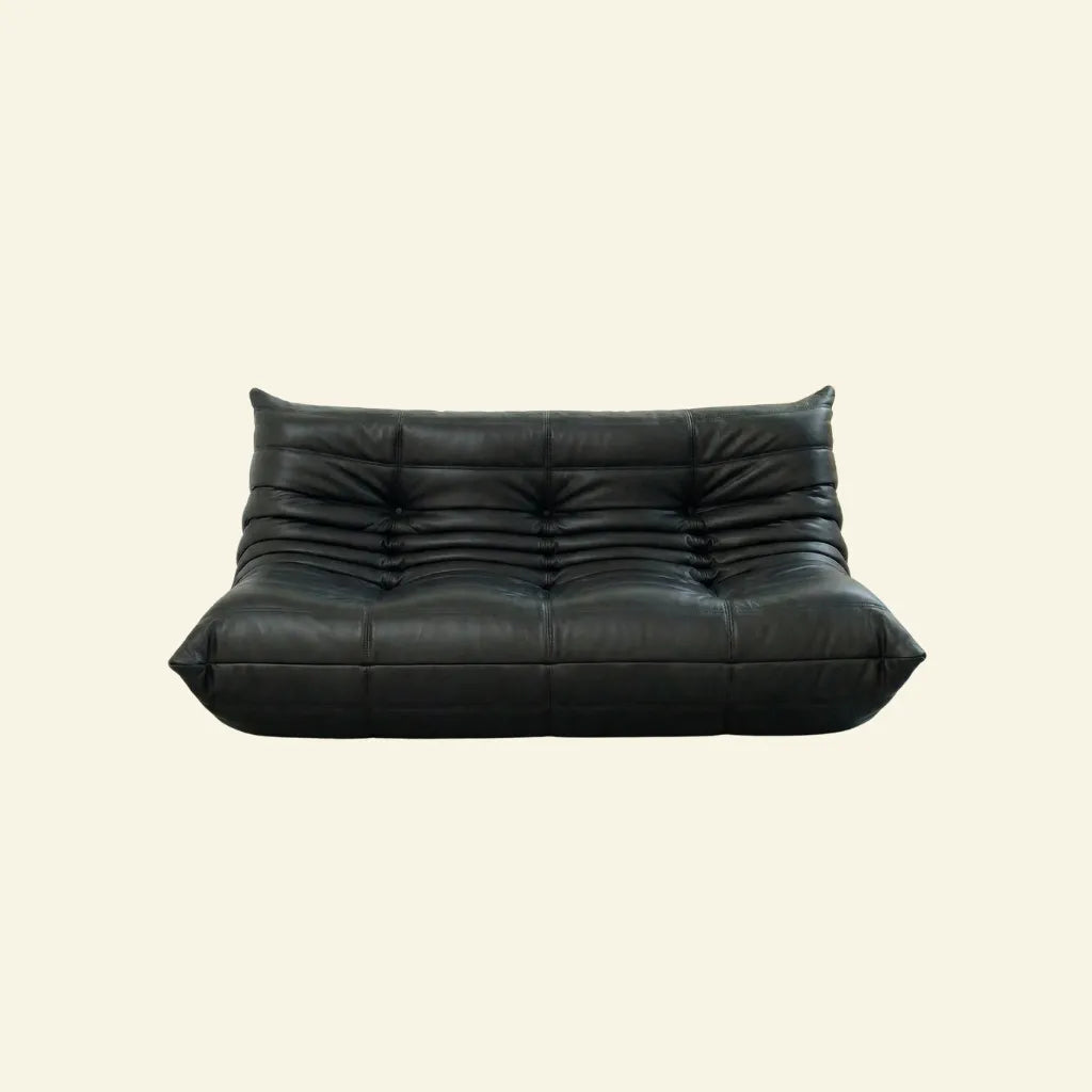 Black togo 3-seater leather sofa dupe on a beige background