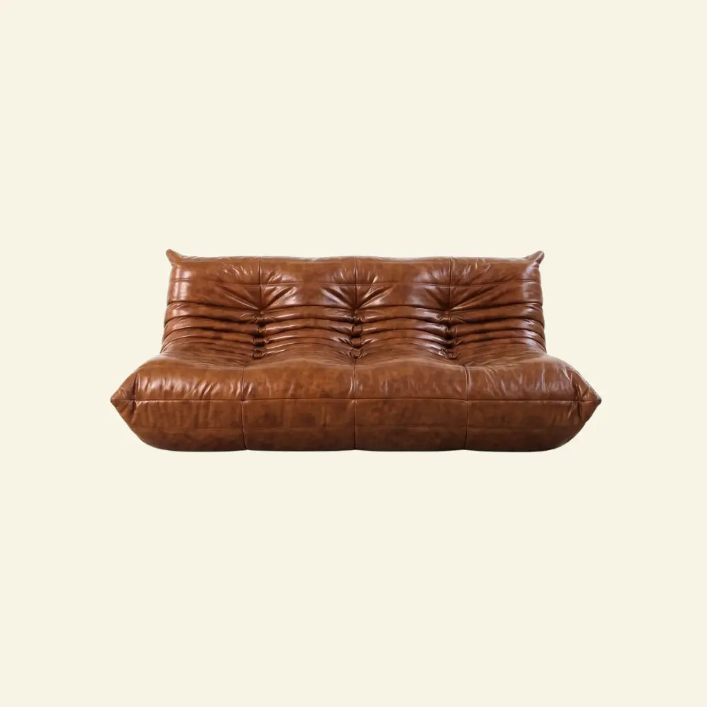 Brown leather togo sofa 3-seater dupe on a beige background5
