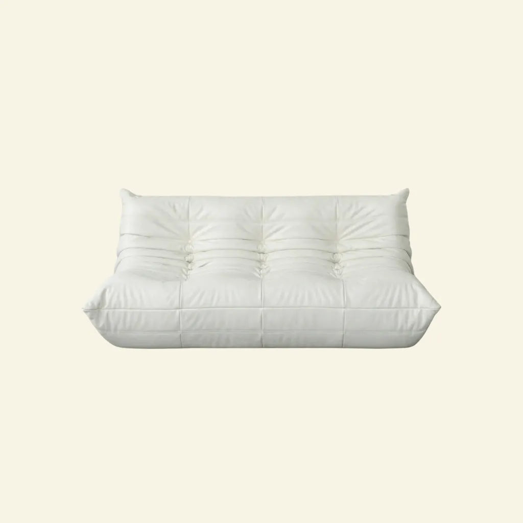 White 3-seater togo sofa dupe in leather on a beige background