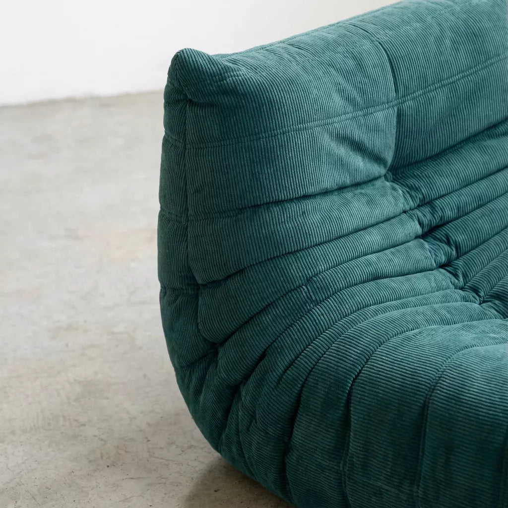 Close-up of the dupe turquoise corduroy togo fireside chair lounger – soft, dirt-resistant fabric with comfortable texture