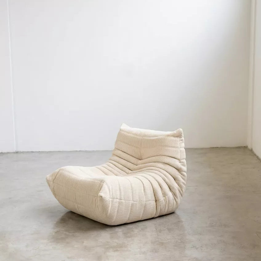 Handmade caterpillar sofa chair as dupe in corduroy cream – plush high-density sponge filling for ergonomic comfort