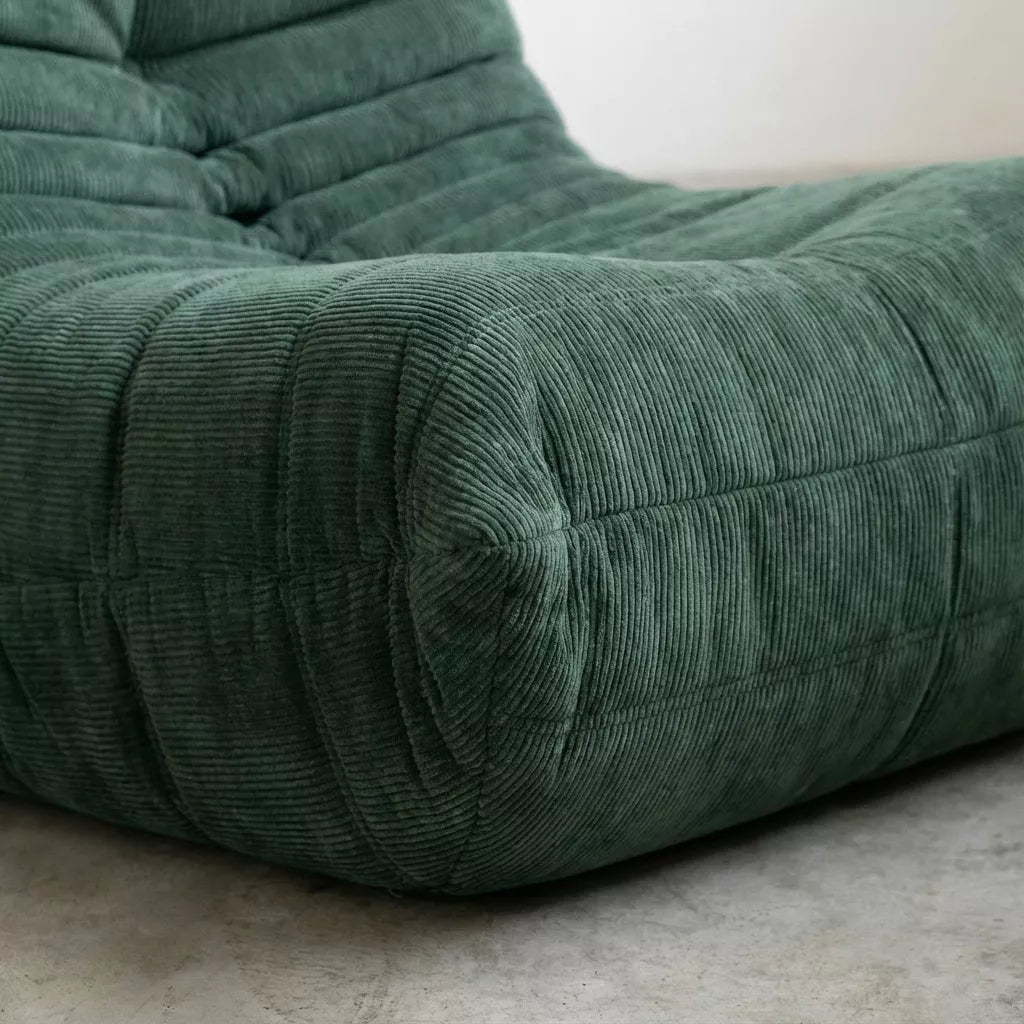Close-up of the dupe green corduroy togo fireside chair lounger – soft, dirt-resistant fabric with comfortable texture