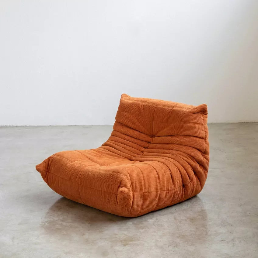 Handmade caterpillar sofa chair as dupe in corduroy orange – plush high-density sponge filling for ergonomic comfort