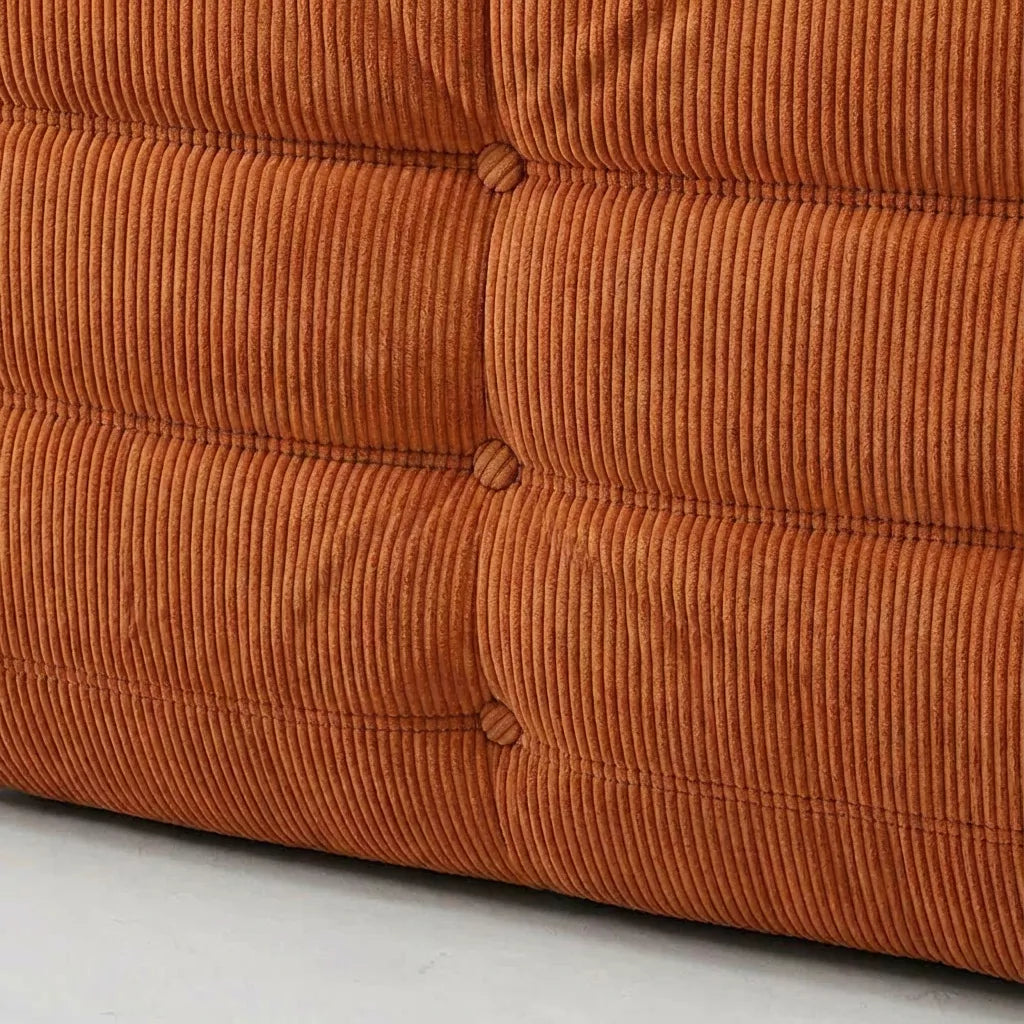 Handmade caterpillar sofa chair as dupe in corduroy orange – plush high-density sponge filling for ergonomic comfort