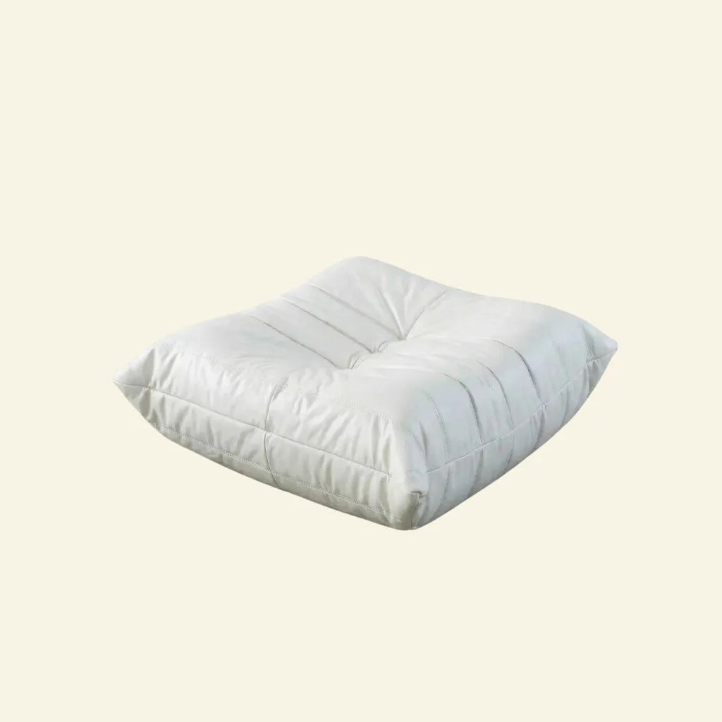 White togo ottoman dupe on a beige background