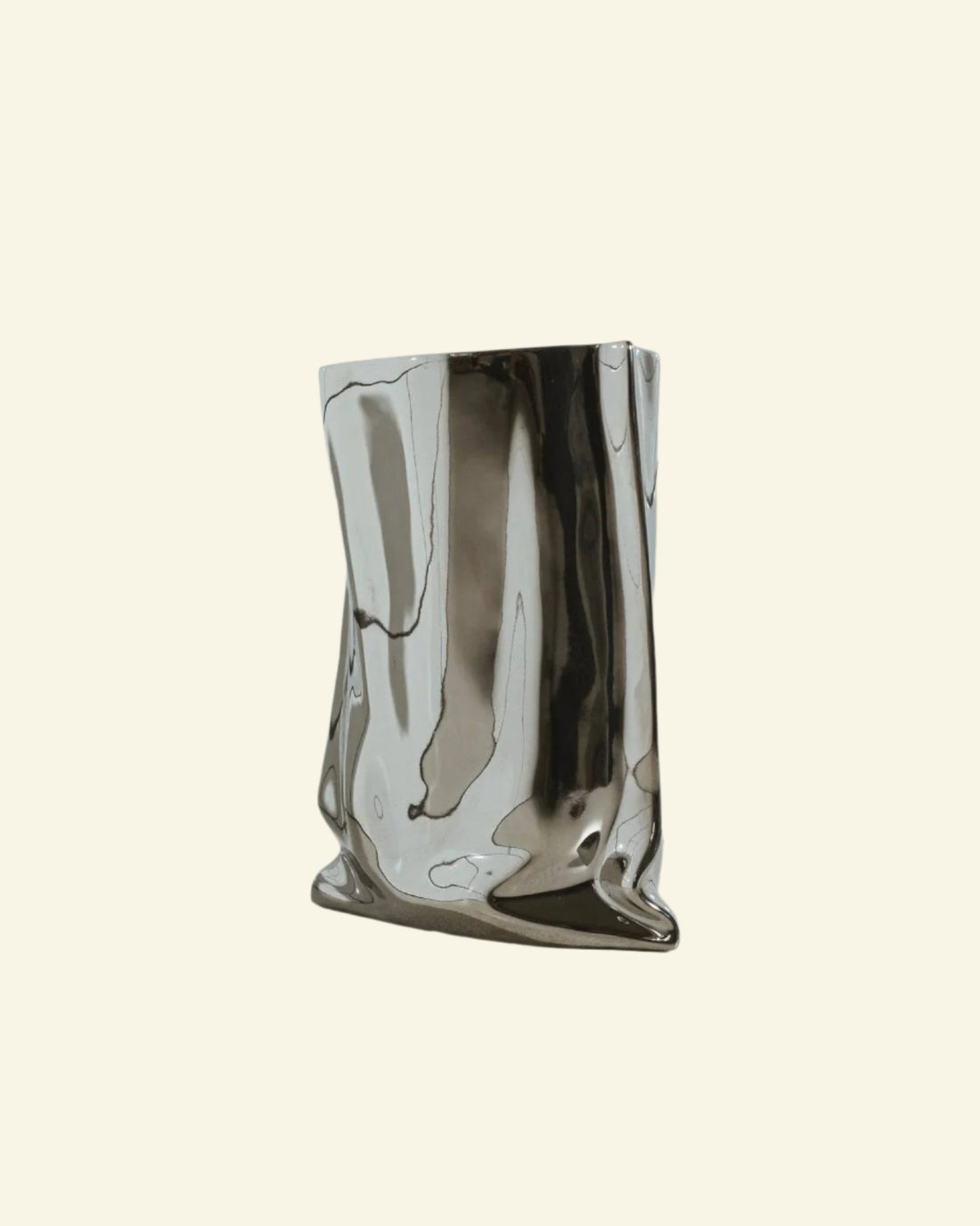 High-gloss silver flower vase with soft ruffled edges and sculptural design, perfect for holding florals or displaying solo