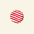 Red and white striped artisan handmade ceramic plate on a beige background