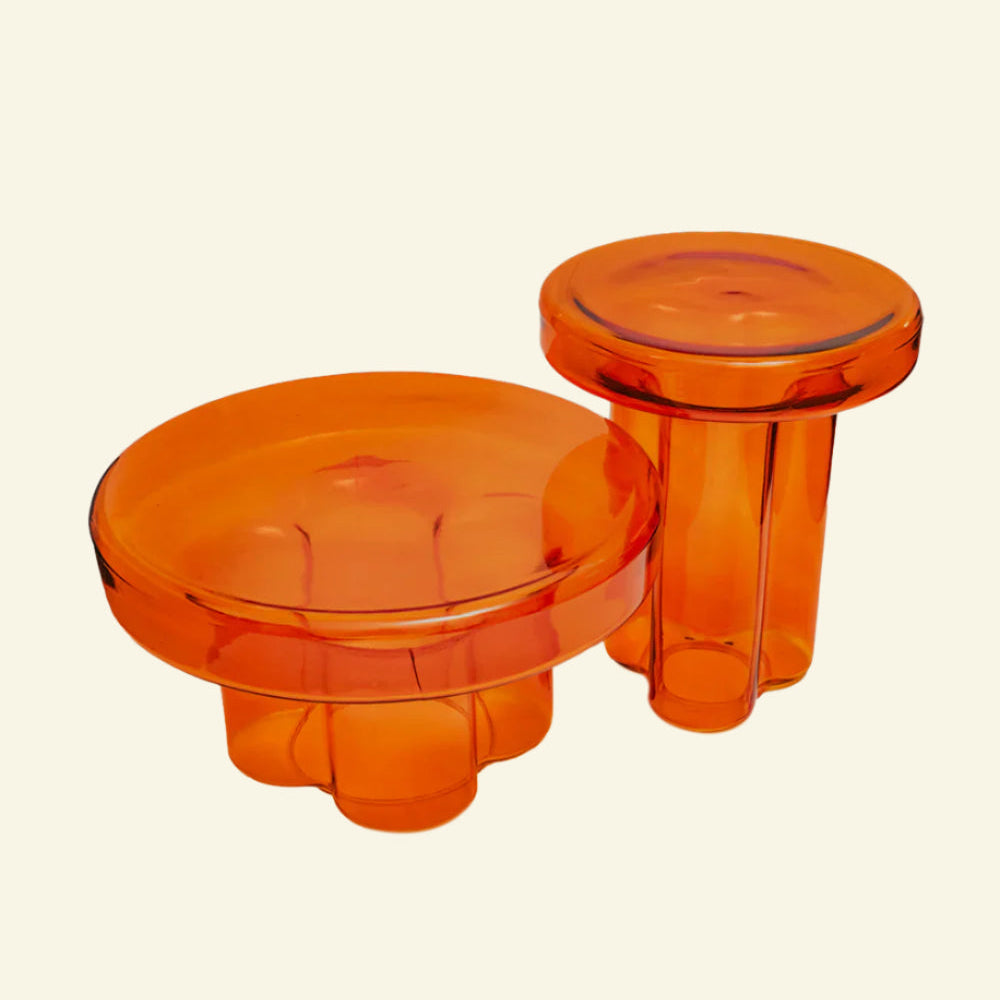 Amber glass side table wide and tall version on beige background