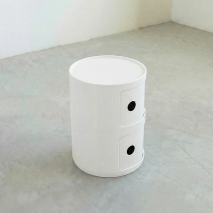 Kartell Componibili dupe round modular storage unit in white glossy plastic with two tiers on concrete floor in white studio