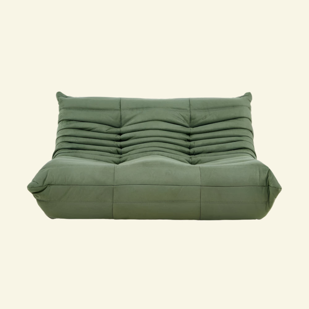 Matcha-green velvet Togo-style 2-seater sofa  – low, frameless design with plush channel tufting