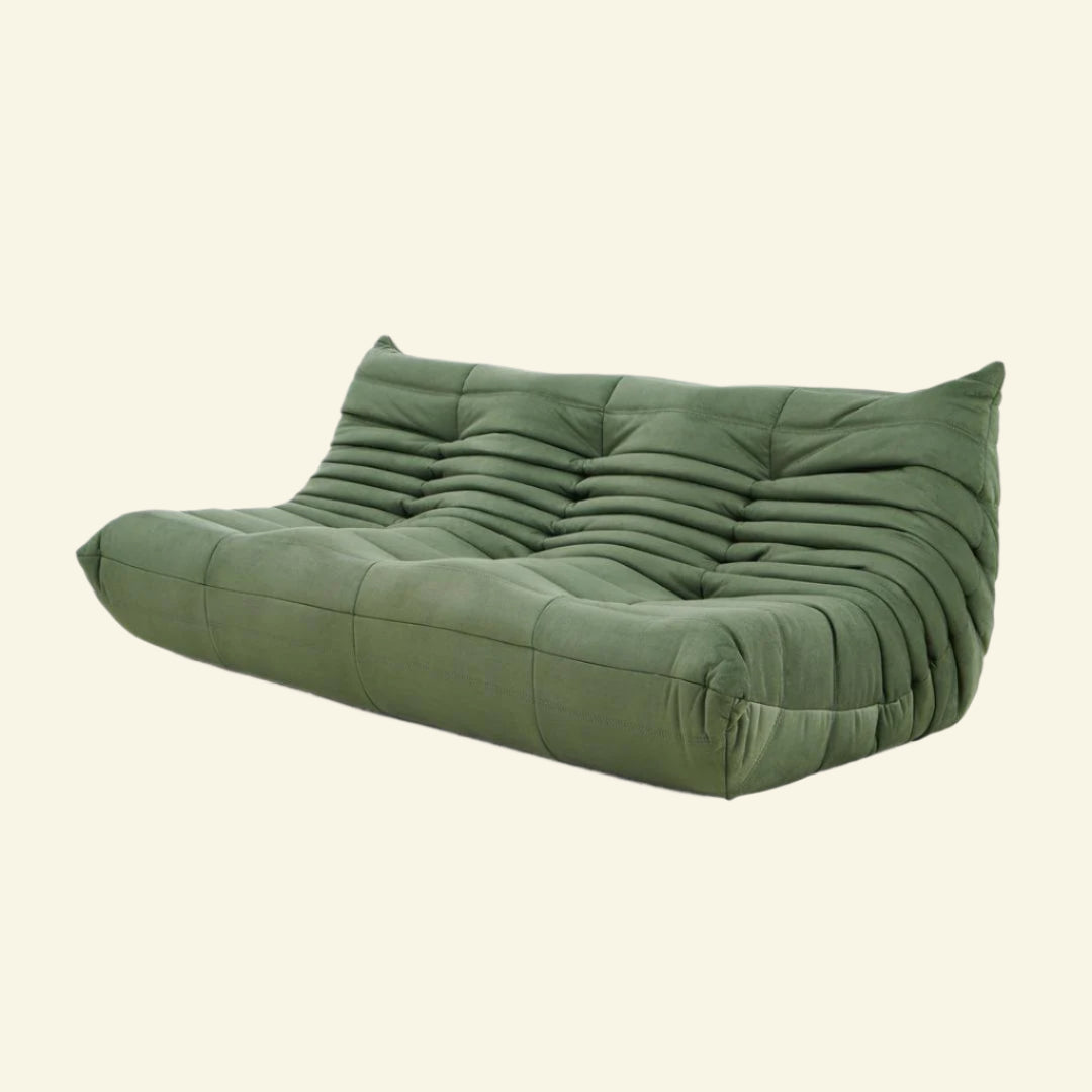 Matcha-green velvet Togo-style 3-seater sofa  – low, frameless design with plush channel tufting