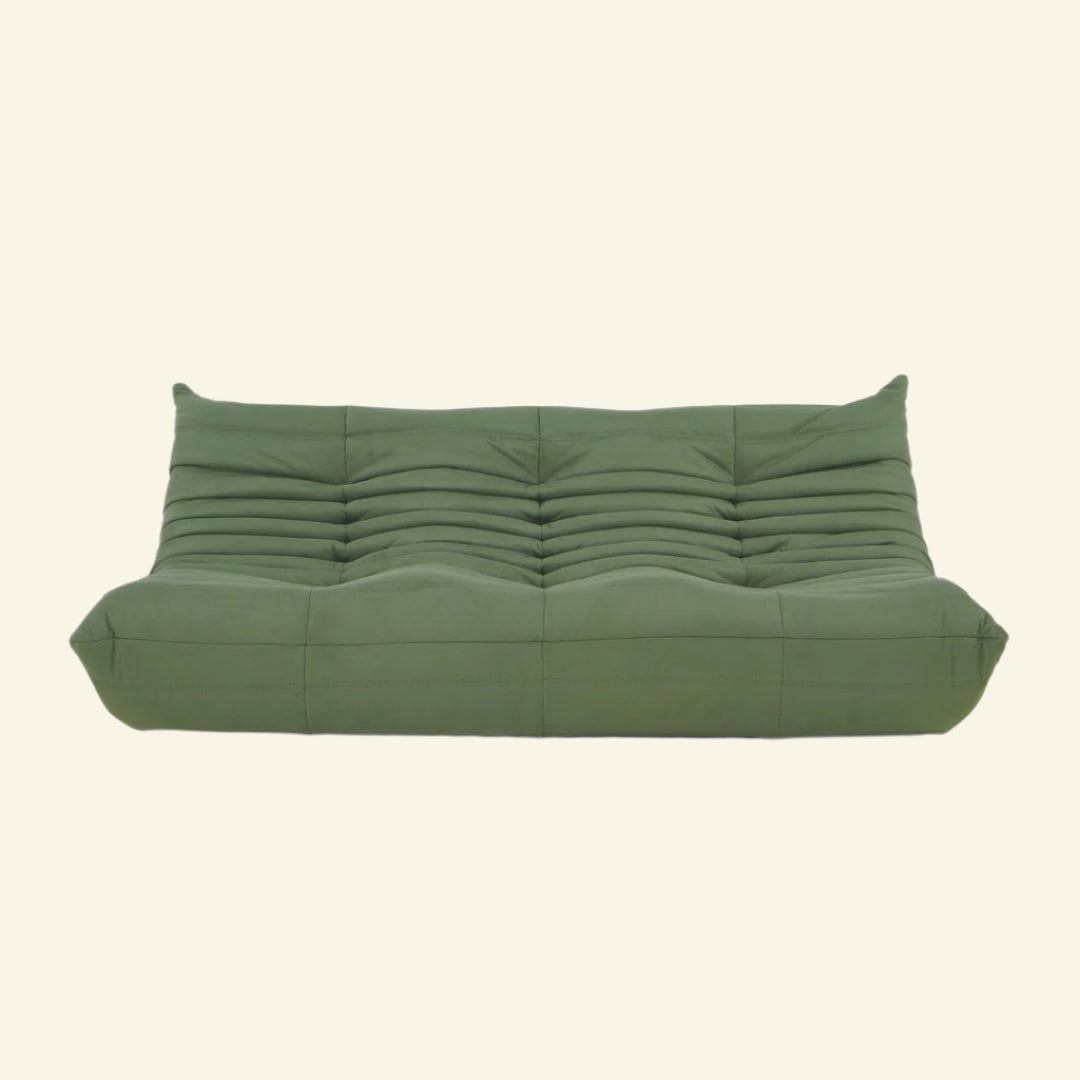 Matcha-green velvet Togo-style 3-seater sofa  – low, frameless design with plush channel tufting