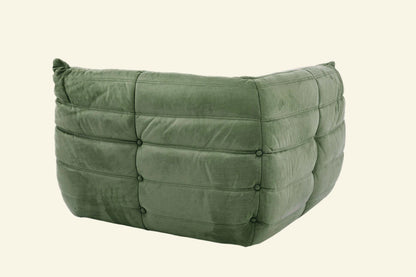 Ultra-comfortable Togo-inspired corner chair with soft suede-like velvet – bold yet soothing furniture for creative homes