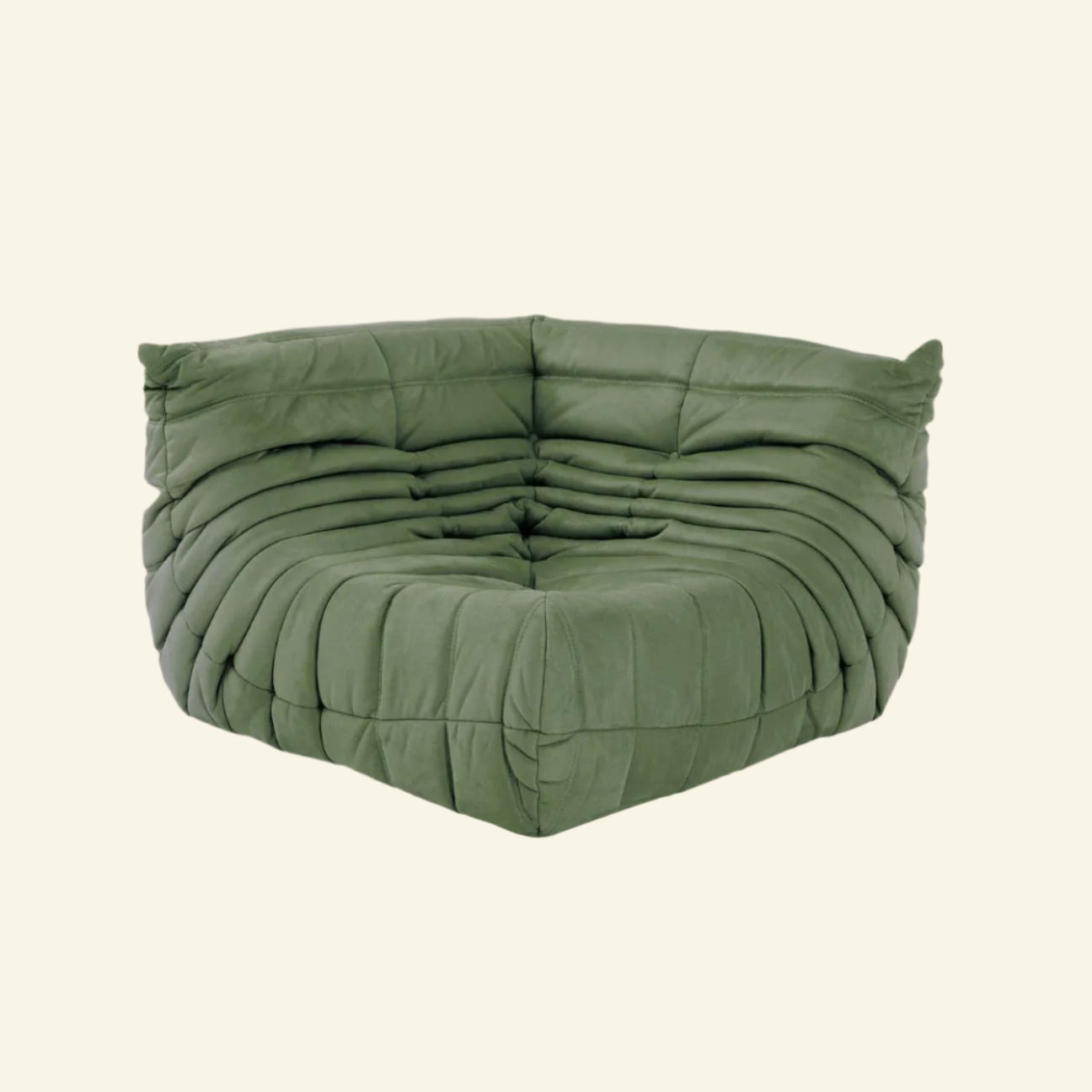 Matcha-green velvet Togo-style corner sofa  – low, frameless design with plush channel tufting